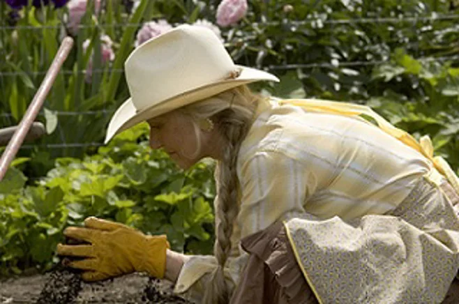 Senior Lady Gardening with Hat Senior Lady Gardening with Hat